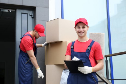 Loading furniture and boxes into a removals van