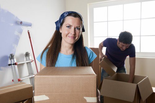 Local van service preparing boxes and furniture for delivery in Oakleigh Park