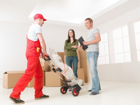 Boxes and household items arranged for unloading at the new property