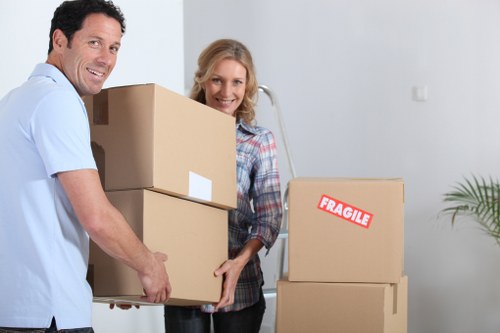 Packed boxes and furniture ready for transport during a house move