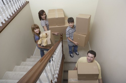 Packed boxes and furniture ready for transport during a local removal